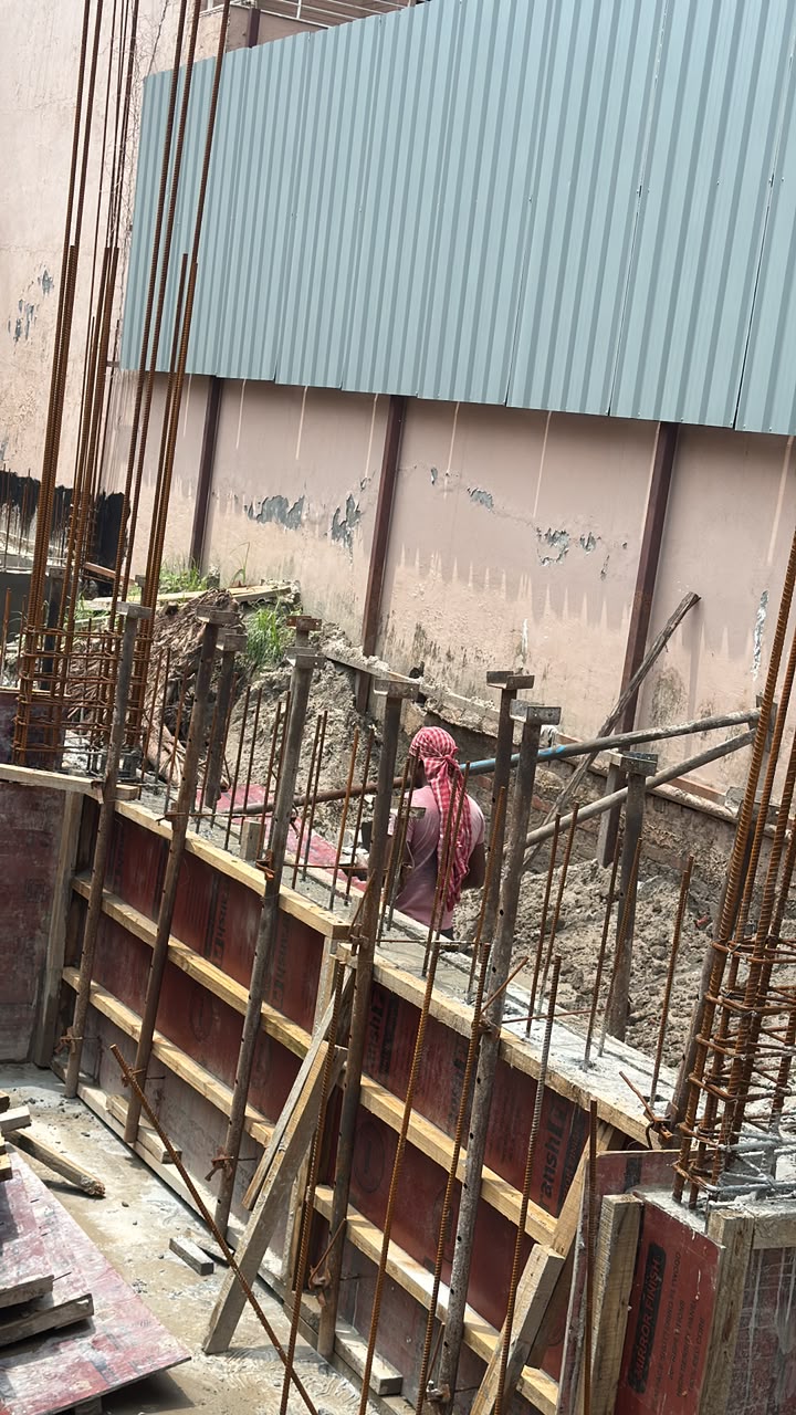 Retaining wall shuttering with tie rods at our Sector 44 Noida site